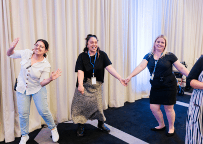 Afford IDPwD event employees dancing