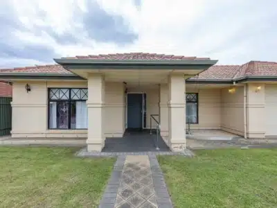 SIL house in Mawson Lakes with ramp access and a grassed front garden.