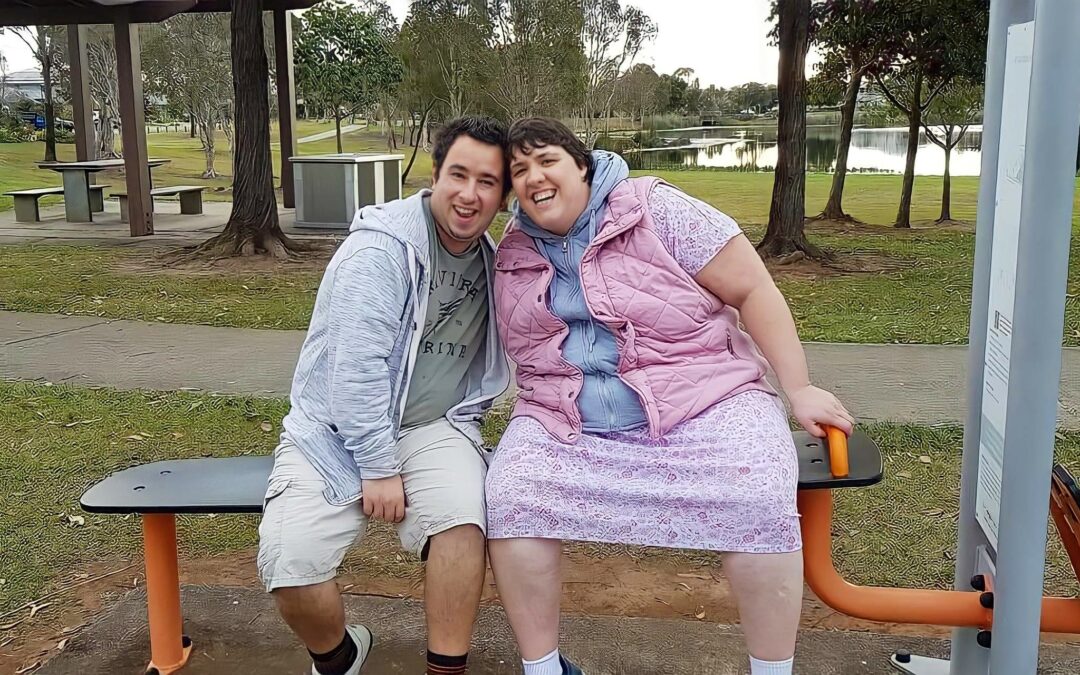 Josh and Amy on a park bench