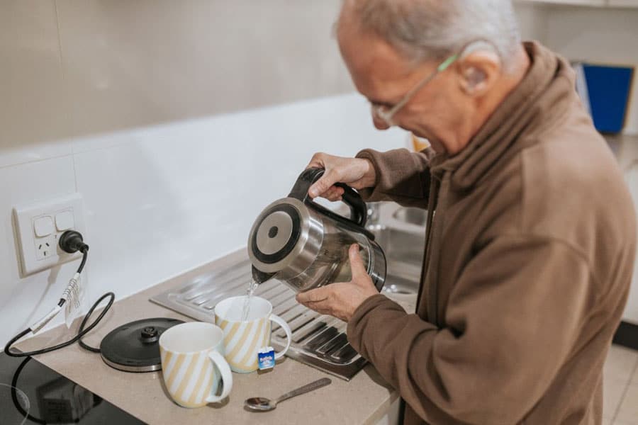 a man making a cup of tea